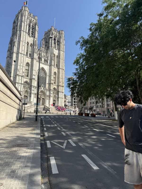 Walking beside the Cathedral of St. Michael and St. Gudula in Brussels