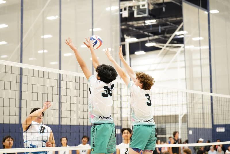 Club volleyball at the net