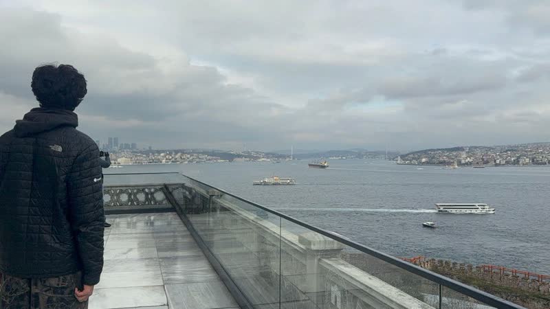 Pranil in a North Face jacket looking across the Bosphorus from a terrace